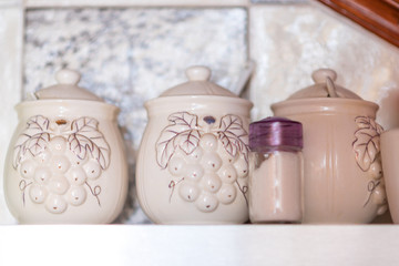 Kitchen Accessories, porcelain jars with olive oil and vinegar,salt and pepper.