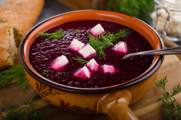Beet soup with cheese and herbs