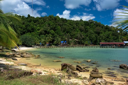Tropical landscape of fisherman bay with turquoise clean water and pier in the. Koh Rong Samloem. Cambodia, Asia.