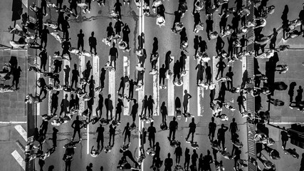 Aerial view from drone on crowd of people who is starting their run on marathon event. Funny shadows on asphalt. - 200722312