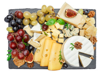 various types of cheese on stone serving board
