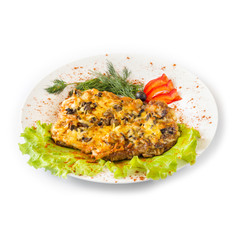 Pork chop with pepper on a white plate. Isolated
