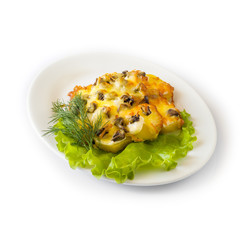 Potatoes baked in mushroom sauce with cheese on a white plate. Isolated