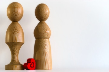 two wooden figures on the left edge of the picture and an heart in their middle, system board,...