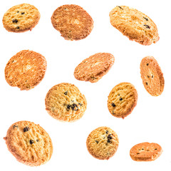 set falling of butter cookies with raisins isolated on white background