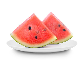 Watermelon slices in white plate on white background