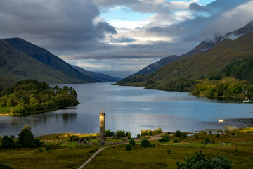 Glenfinnan Monument and Loch Shiel lake. Highlands Scotland Uk