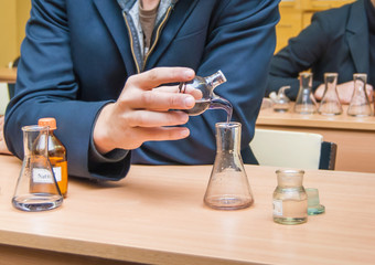 students experimenting and discovering in science class