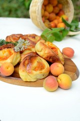 Buns made from yeast dough with apricot