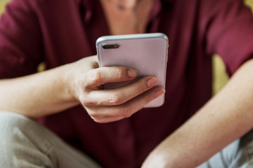 Woman playing on her phone