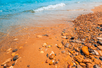 Rocks and soft waves on sea coast