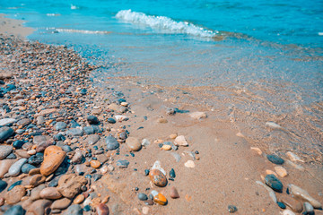 Rocks and soft waves on sea coast