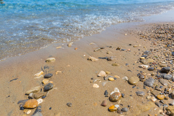 Rocks and soft waves on sea coast