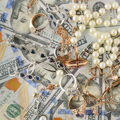Paper Money and Jewelry. Flat lay, top view.