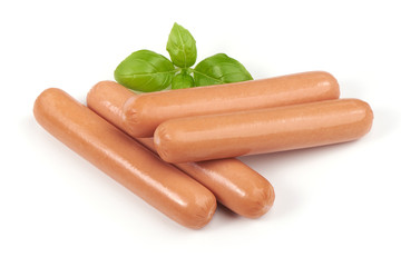 Boiled sausages with basil, isolated on white background.