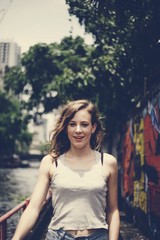 Fototapeta premium Young caucasian woman relaxing outside