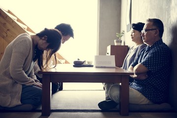 Japanese family greeting bowing with senior © Rawpixel.com