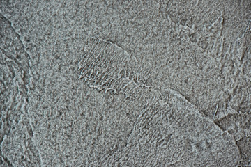 Texturized grey putty. Vintage or grungy background of venetian stucco texture as pattern wall.