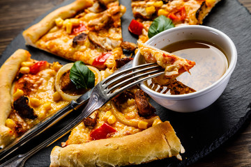 Pizza with chicken and vegetables on white background