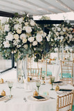 Wedding table decor in white green tones