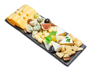 various types of cheese on stone board