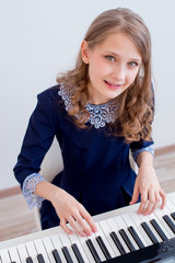 Girl playing synthesizer
