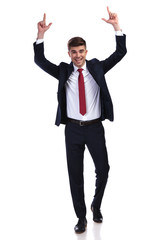 excited walking businessman celebrates success