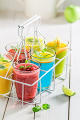 Yummy smoothie with fruity yogurt in white basket