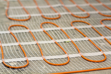 Heating cable for warm floor close-up detail. Renovation works.