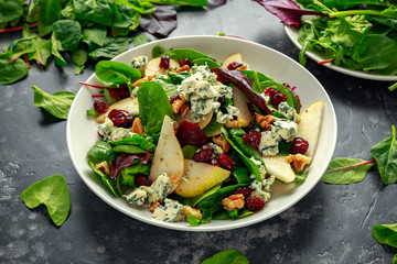 Fresh Pears, Blue Cheese salad with vegetable green mix, walnuts, cranberry. healthy food