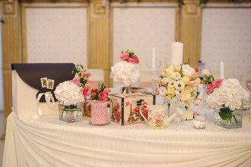 Fototapeta na wymiar Wedding table decorated with flowers: