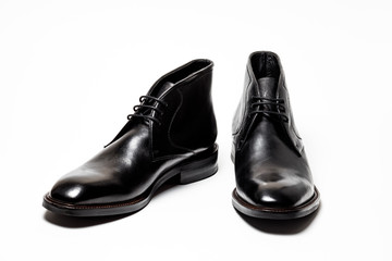 Black leather male shoes, white background