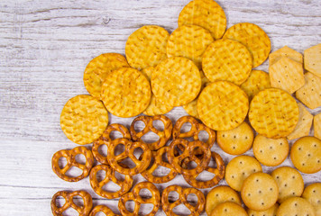 Mix of snacks : pretzels, crackers, cookies.