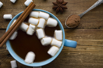 blue Cup of cocoa with marshmallows