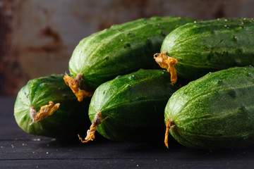 ripe cucumber on rustic table