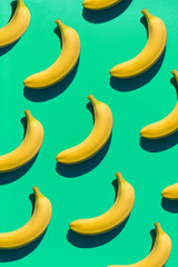Ripe bananas on green surface © nerudol