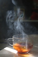 mug with smoke on a table