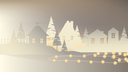 White paper village, houses with pine tree on the hill decorated with glowing Christmas lights