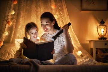 Family reading bedtime.
