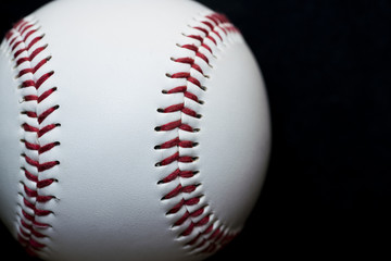 close up baseball on black background, sport team concept