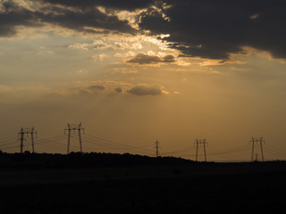 Fototapeta na wymiar Silhouette of power lines at sunset