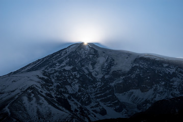 Sunset over Mt. Ararat peak (5137 m) as seen from Ahora Gorge in winter.