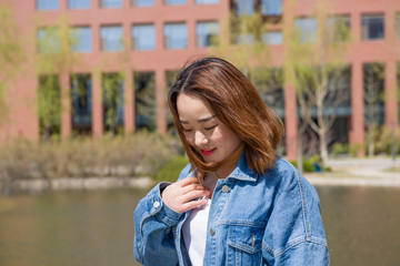 Girl student in university. Portrait of young Asian female university student - Asian Chinese  woman.