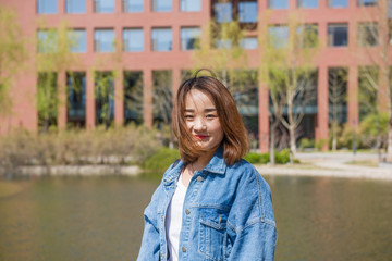 Girl student in university. Portrait of young Asian female university student - Asian Chinese  woman.