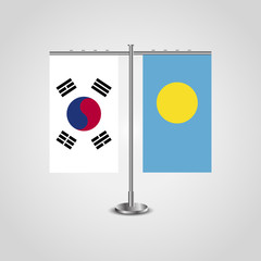 Table stand with flags of South Korea and Palau.Two flag. Flag pole. Symbolizing the cooperation between the two countries. Table flags