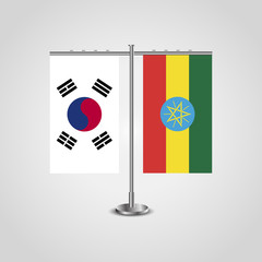 Table stand with flags of South Korea and Ethiopia.Two flag. Flag pole. Symbolizing the cooperation between the two countries. Table flags