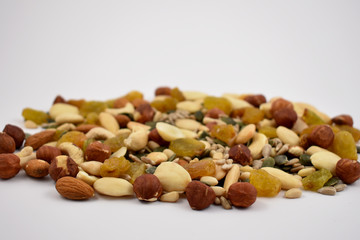 Mix nuts and seeds stock images. Different types of nuts on a white background. Healthy snack
