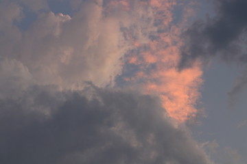 The orange light and clouds in the evening