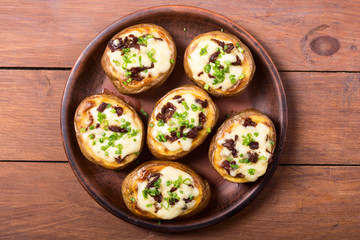 Baked potato stuffed with cheese