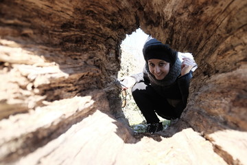 girl looks through the empty trunk